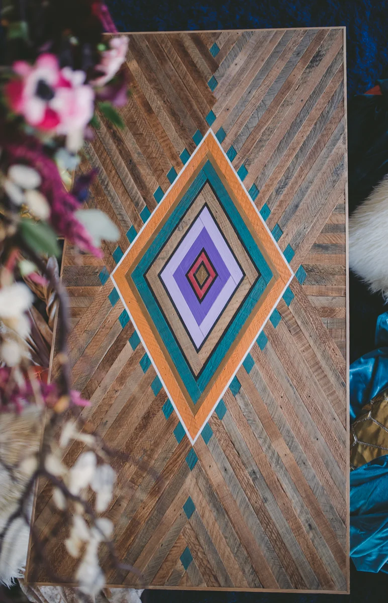 we are young worth the wait studios wood table with diamond pattern in center