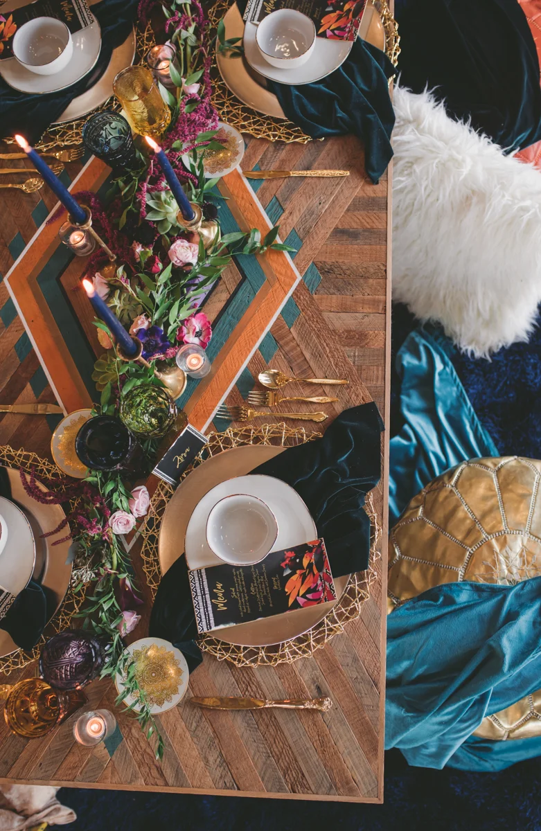 we are young worth the wait studios table and cushions from above