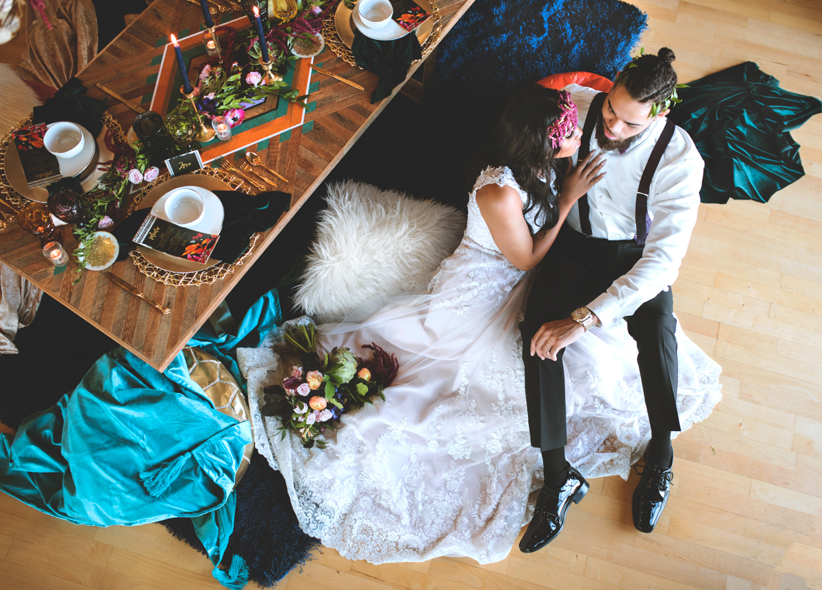 we are young worth the wait studios couple lounging beside table