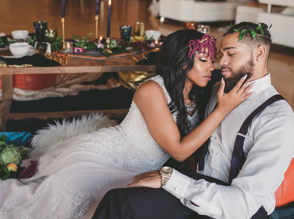 we are young worth the wait studios couple with eyes closed, embrace