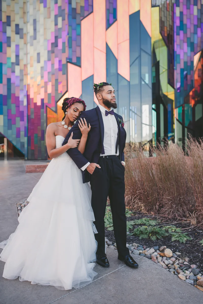 we are young worth the wait studios couple outside stained glass building