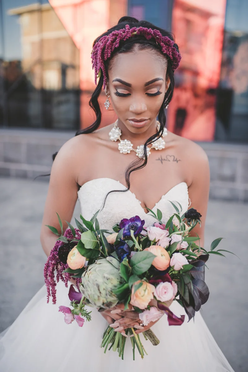 we are young worth the wait studios bride holding bouquet