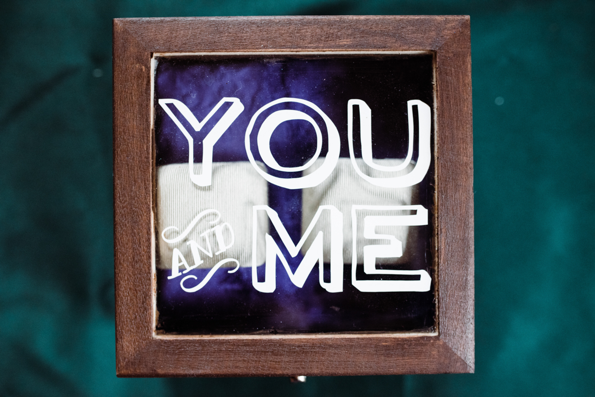 Rustic italian wedding box with glass lid reading "you and me"