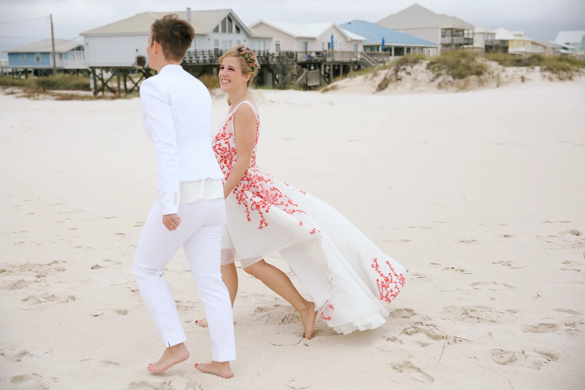 gulf shores destination wedding ajay and kate walking on beach