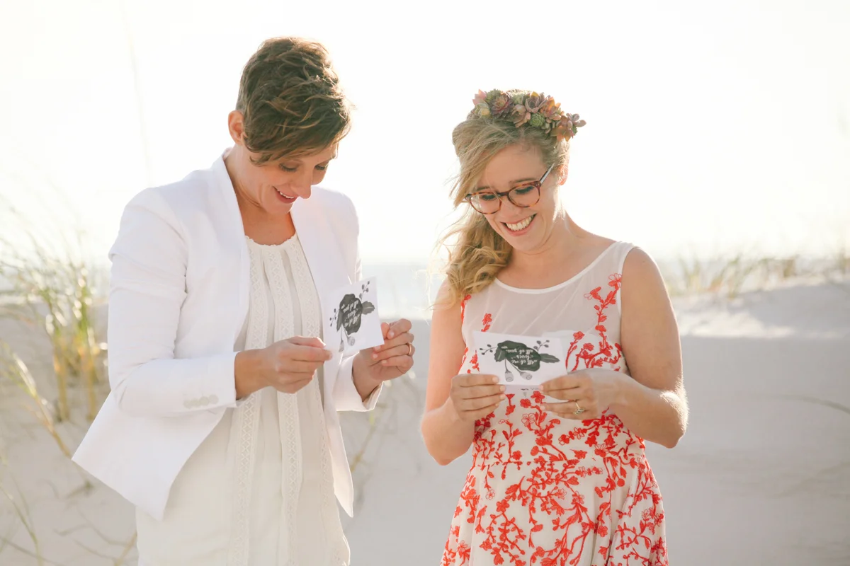 gulf shores destination wedding couple reading cards