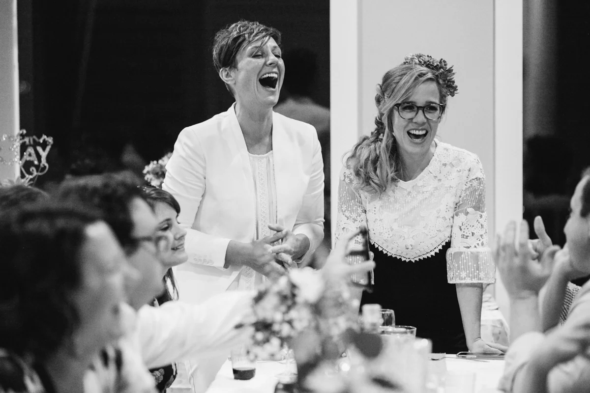 gulf shores destination wedding ajay and kate laughing with guests