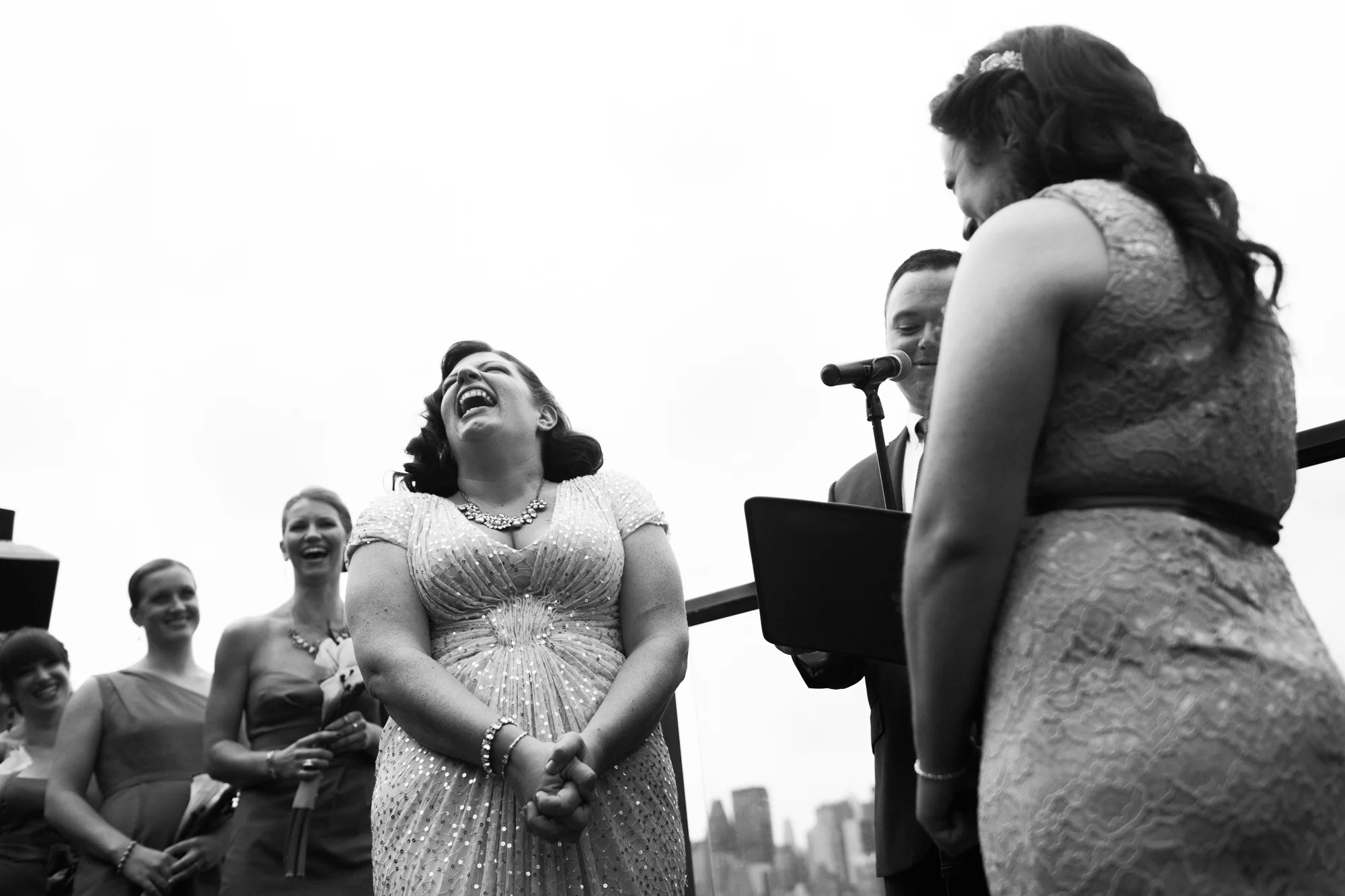 Brides smiling and laughing during their wedding ceremony Corey Torpie Photography NYC