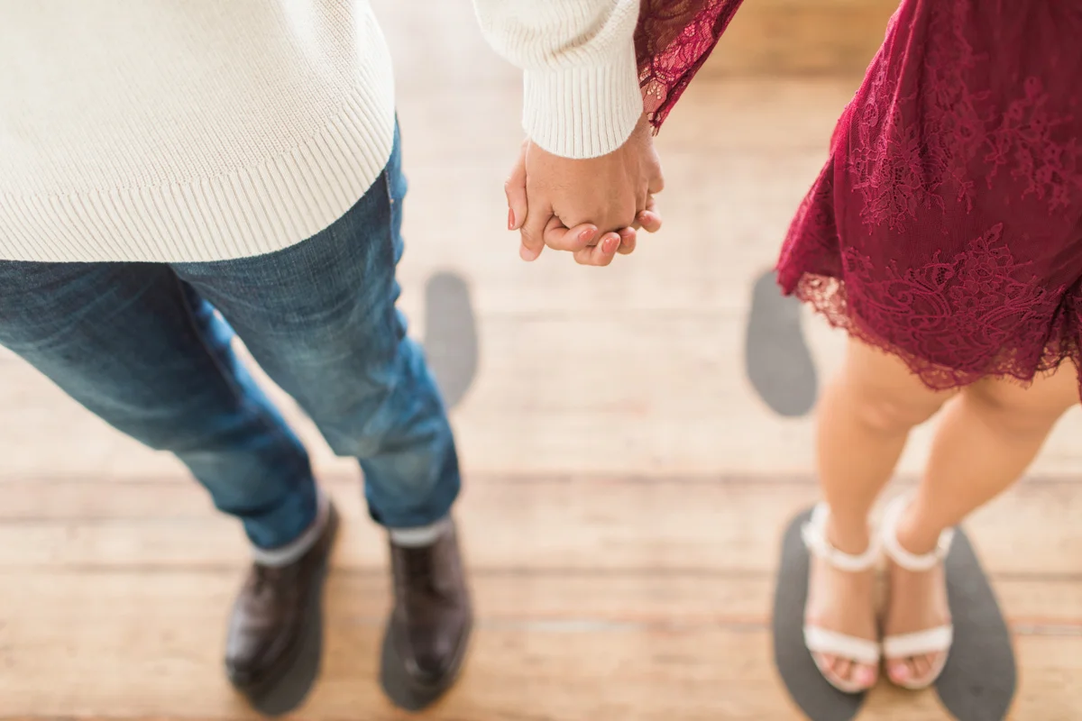 belmont park engagement session san diego angela and jaime's clasped hands