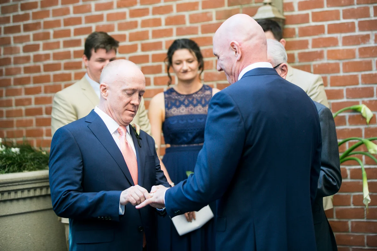 elegant, heartfelt alexandria, va wedding ceremony exchanging rings