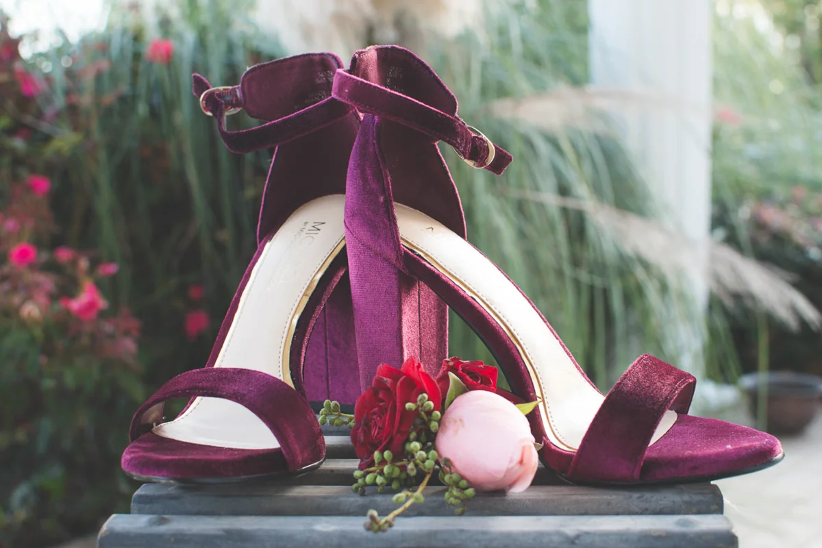 B ohemian Styled Shoot velvet heels on pedestal outside