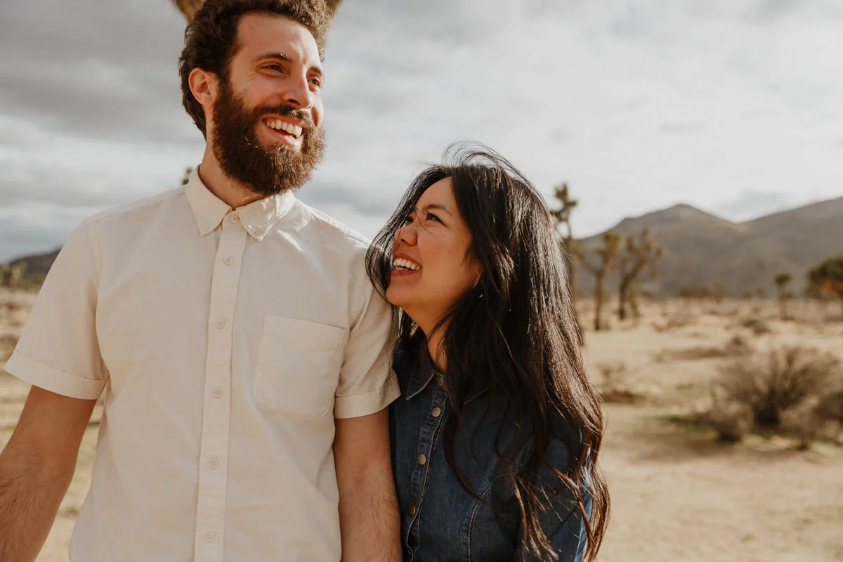 joshua tree california engagement session couple in desert, eda smiling at matt