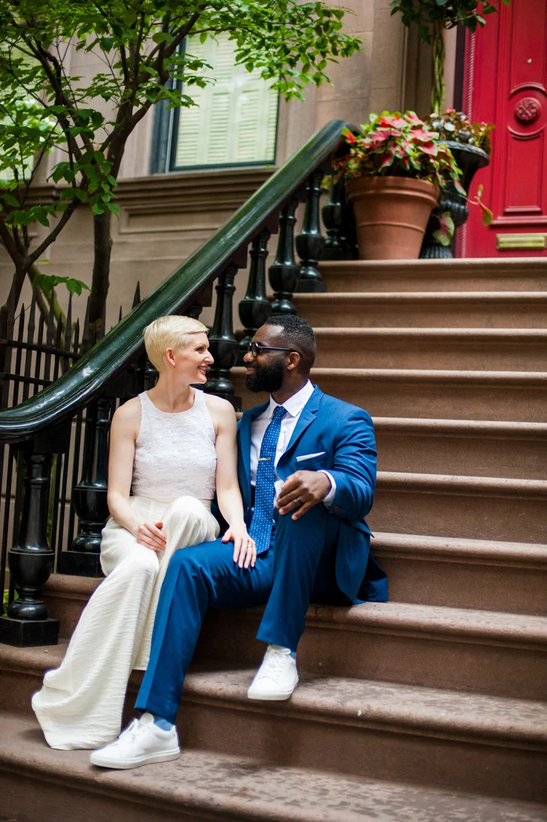 intimate new york elopement couple sitting on steps