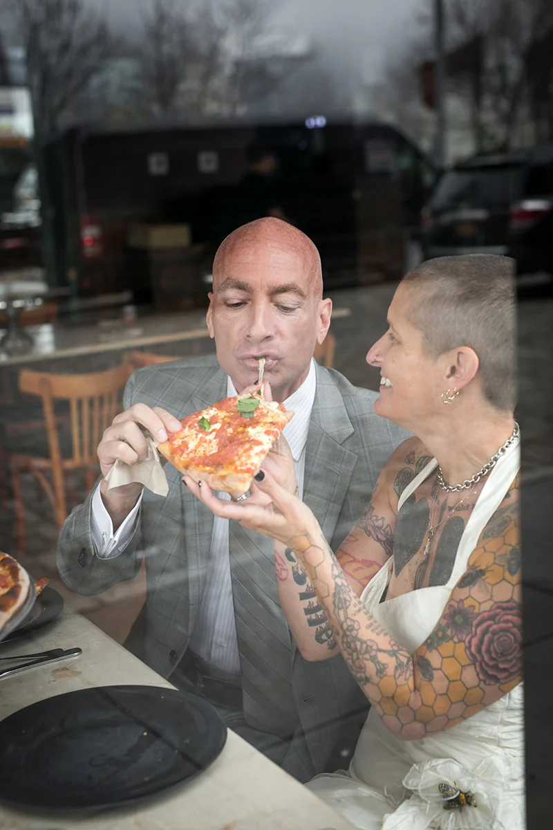 tattooed feminist elopement nyc frank and inger having pizza