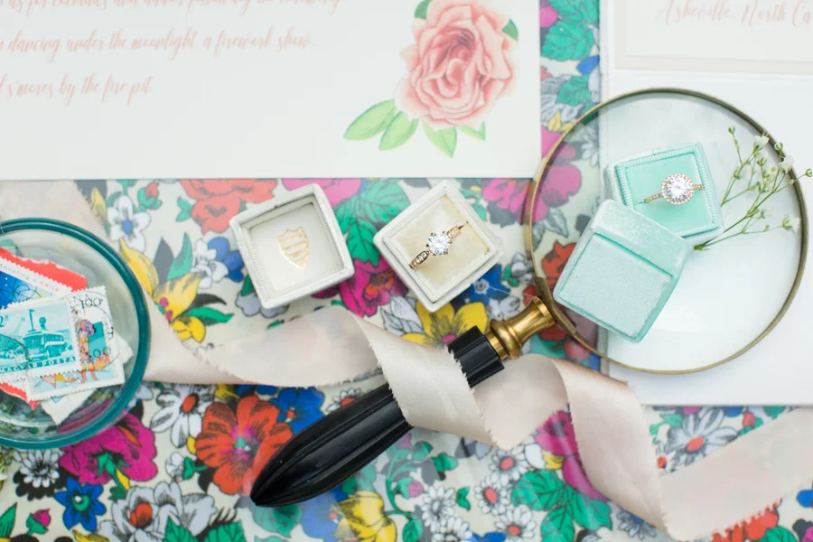 Asheville Glamping airstream trailer colorful floral casual wedding elopement inspiration in Asheville North Caroline by Jessica Hunt photography, Images by Amber Robinson and Ashton Kelley Photography