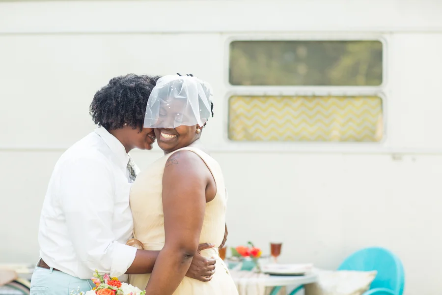 Asheville Glamping airstream trailer colorful floral casual wedding elopement inspiration in Asheville North Caroline by Jessica Hunt photography, Images by Amber Robinson and Ashton Kelley Photography