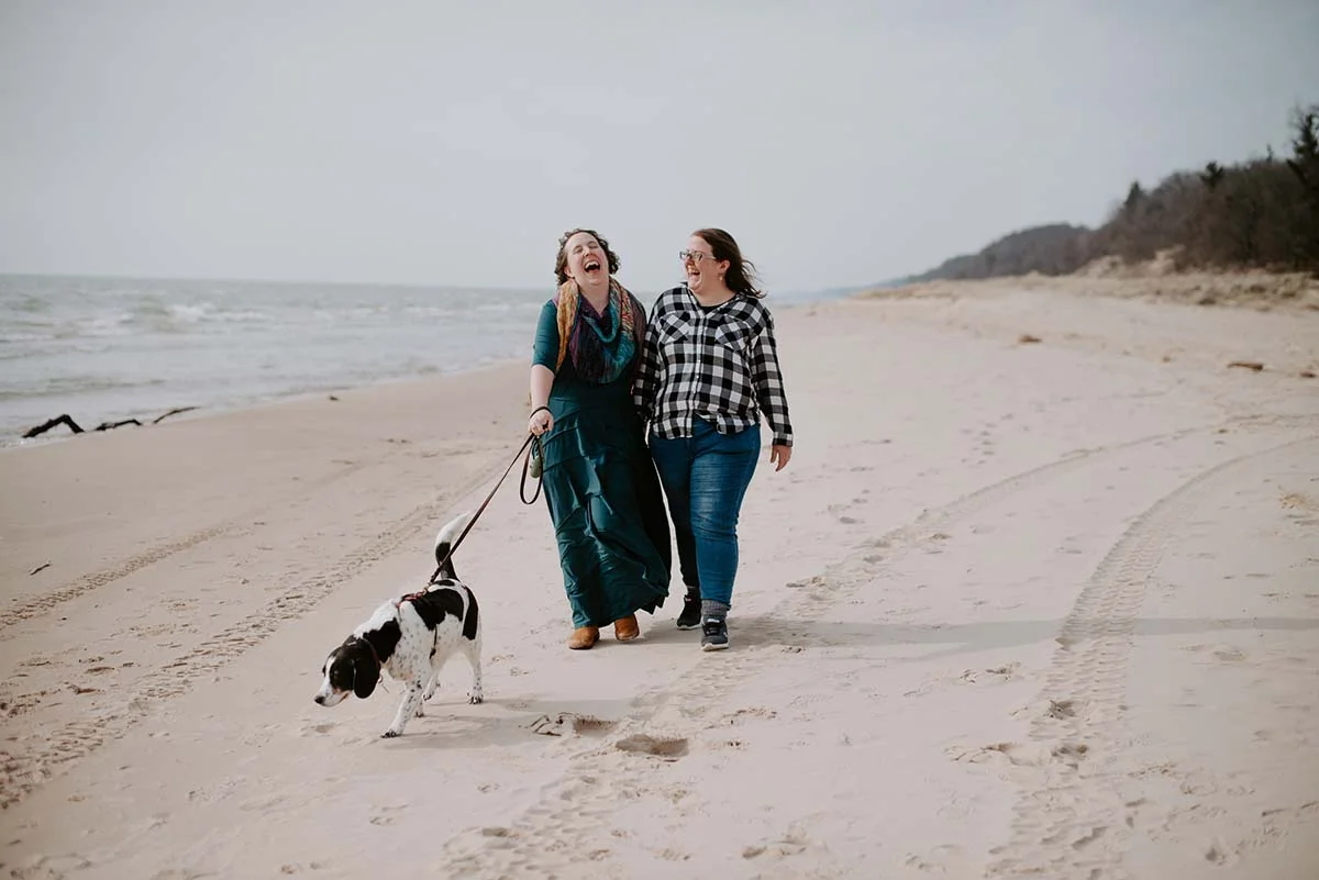 Emily and Ang Beach Wedding Engagement Session at Hoffmaster State Park on Lake Michigan by Liv Lyzsyk Photography