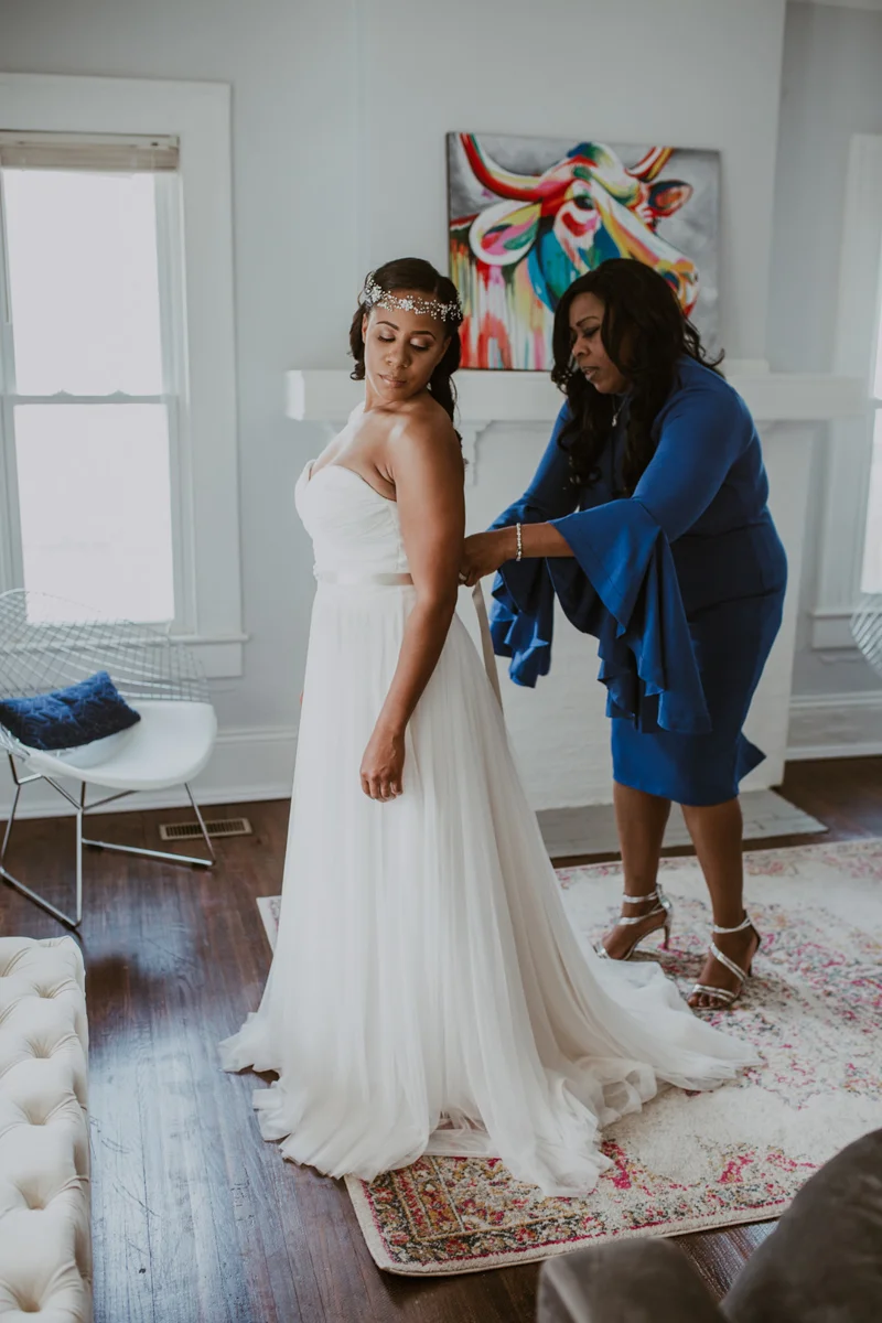 art-inspired levine museum wedding shavonne having dress sash tied