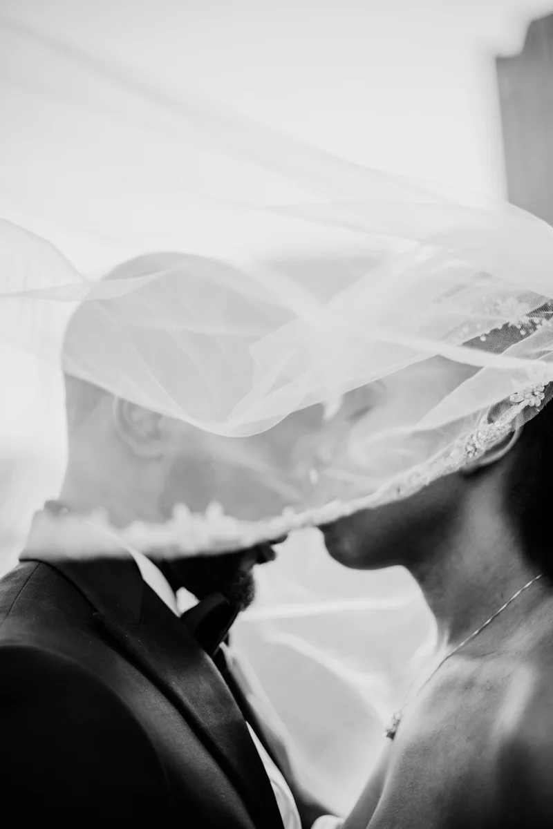 art-inspired levine museum wedding kiss under bride's veil