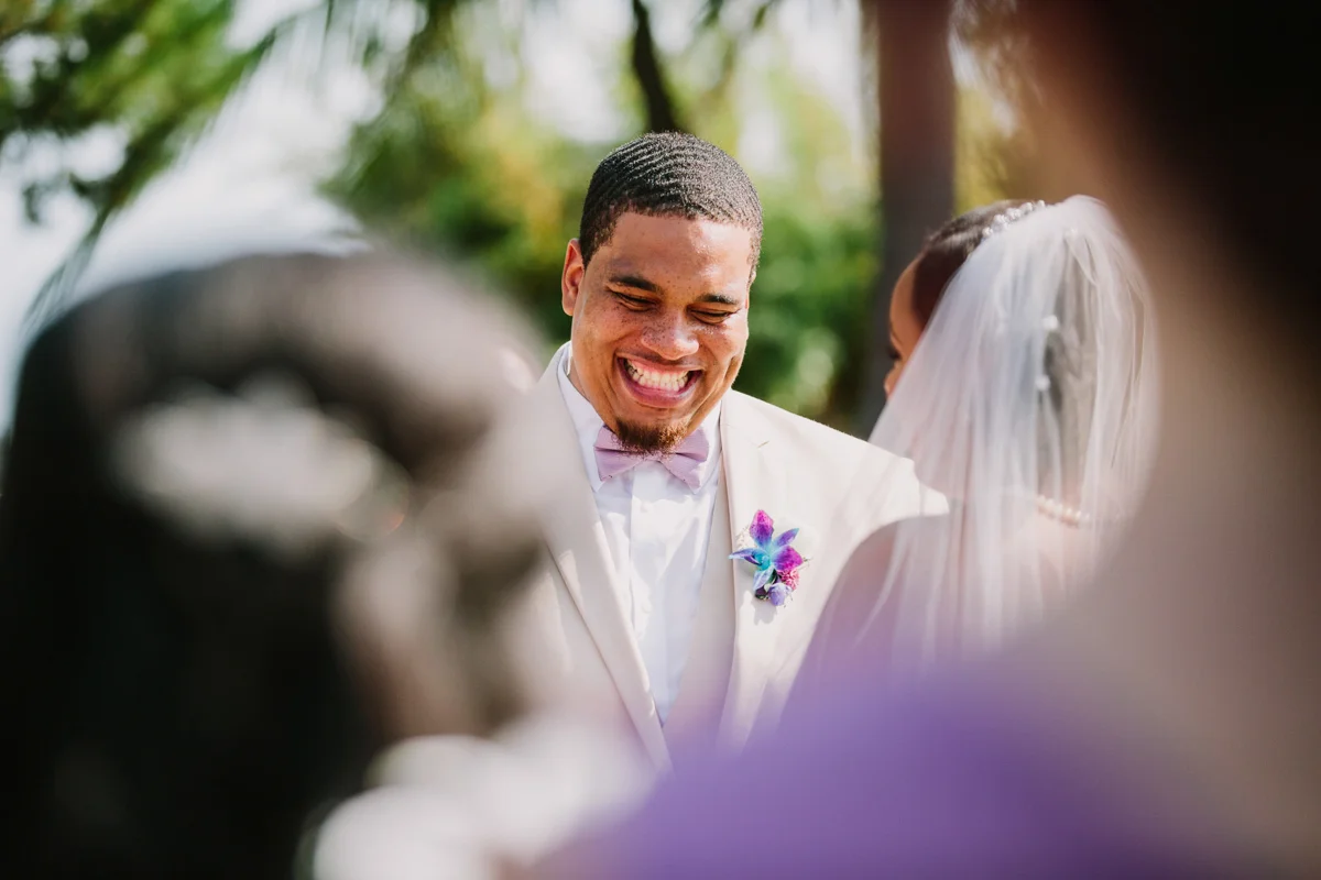 San Diego Tropical-Inspired Wedding william smiling during ceremony