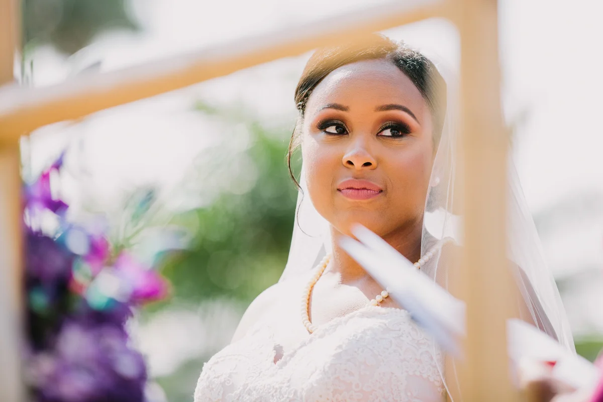 San Diego Tropical-Inspired Wedding candid of janelle during ceremony