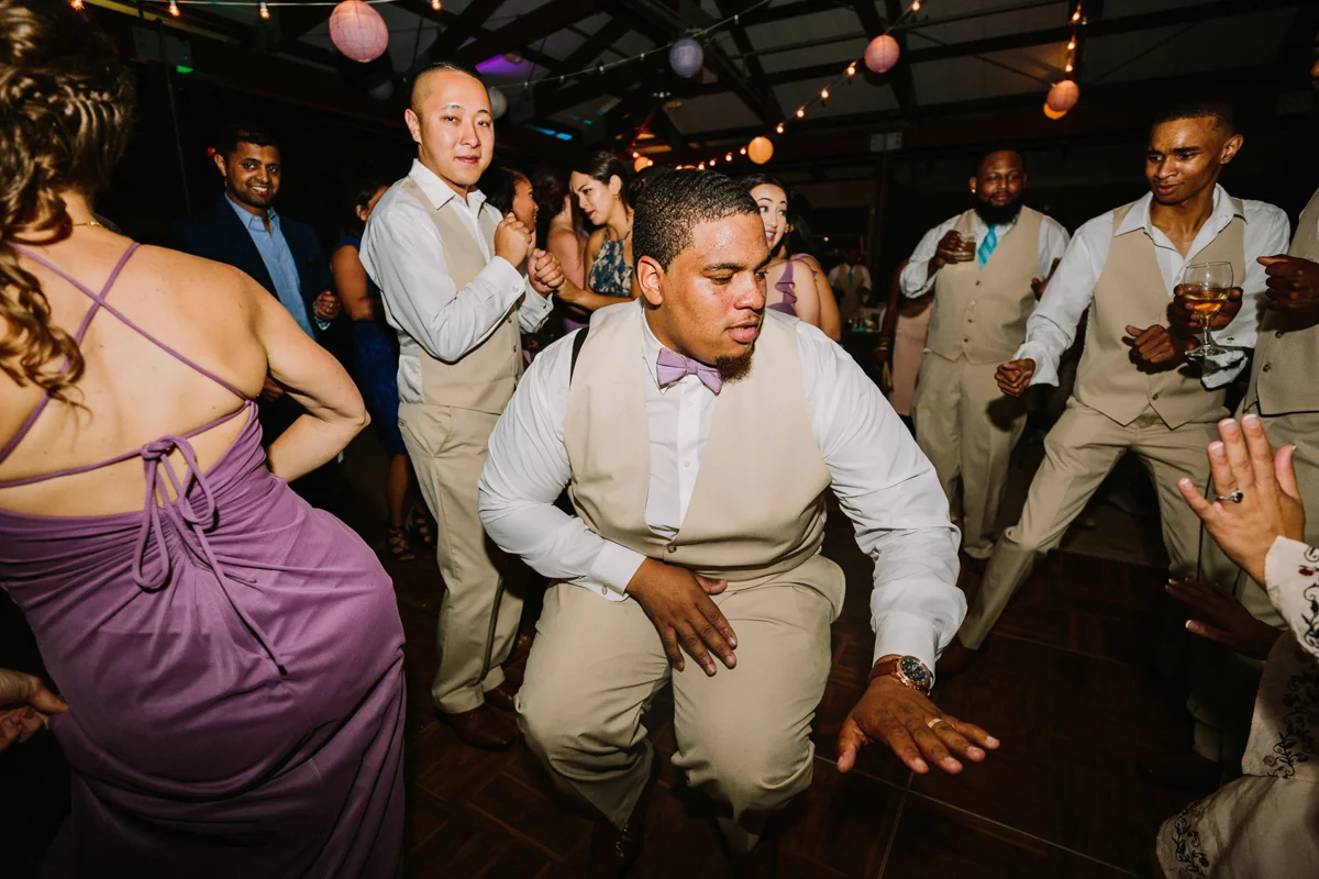 San Diego Tropical-Inspired Wedding william on dance floor with groomsmen