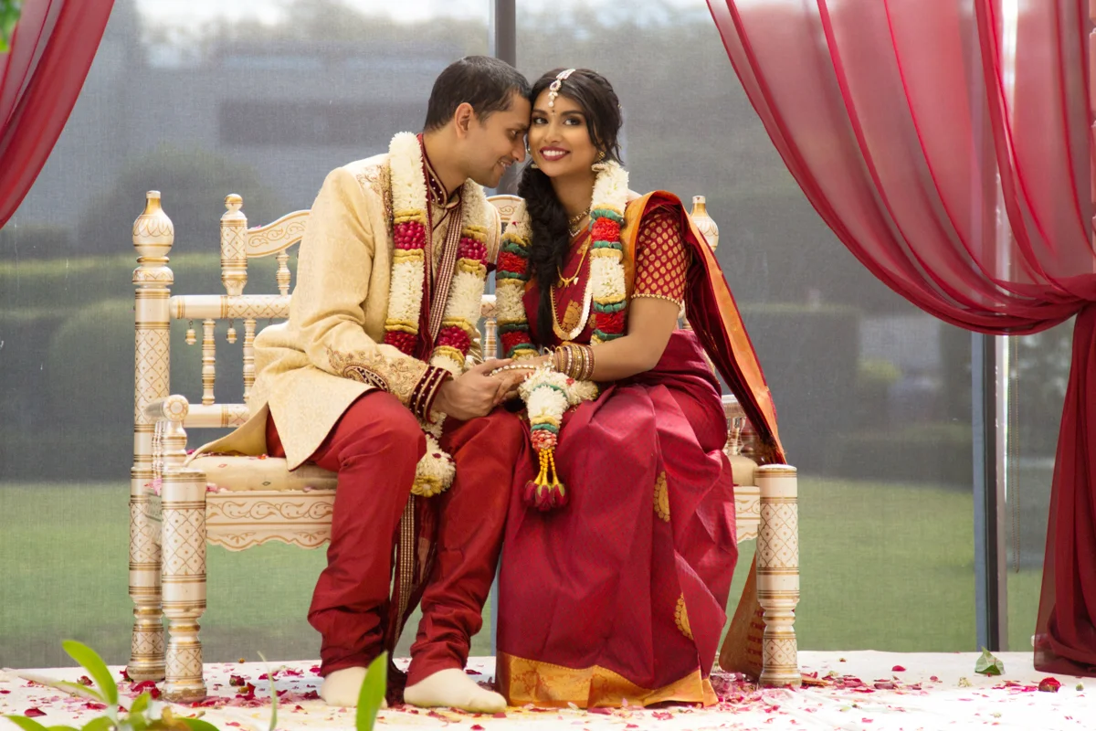 sri lankan wedding in sydney australia abirami and dilshan on ceremonial bench
