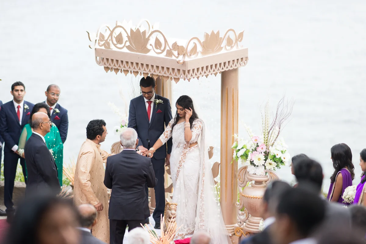 sri lankan wedding in sydney australia couple under altar during ceremony