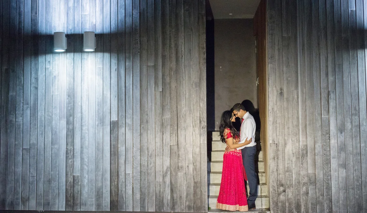 sri lankan wedding in sydney australia couple embracing in stairwell