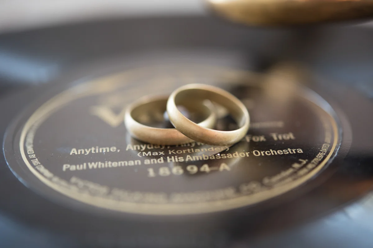 vintage wedding editorial at the art factory paterson new jersey rings on vinyl record