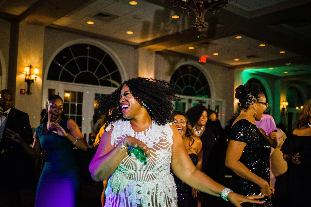 glam wedding river walk south carolina dana and bridesmaids dancing