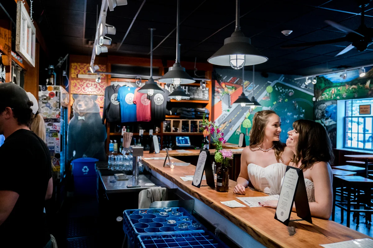 Brewery wedding washington D.C. brides at bar