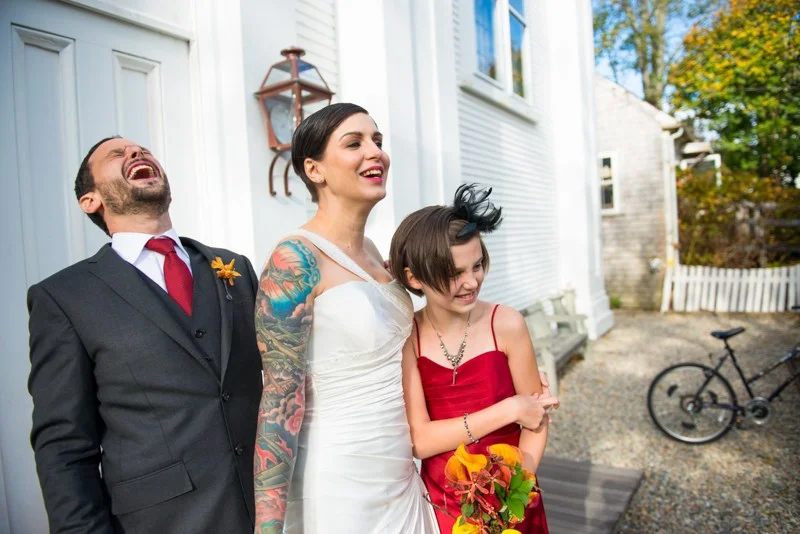 bride with tattoos and groom laughing after wedding michelle schapiro photography