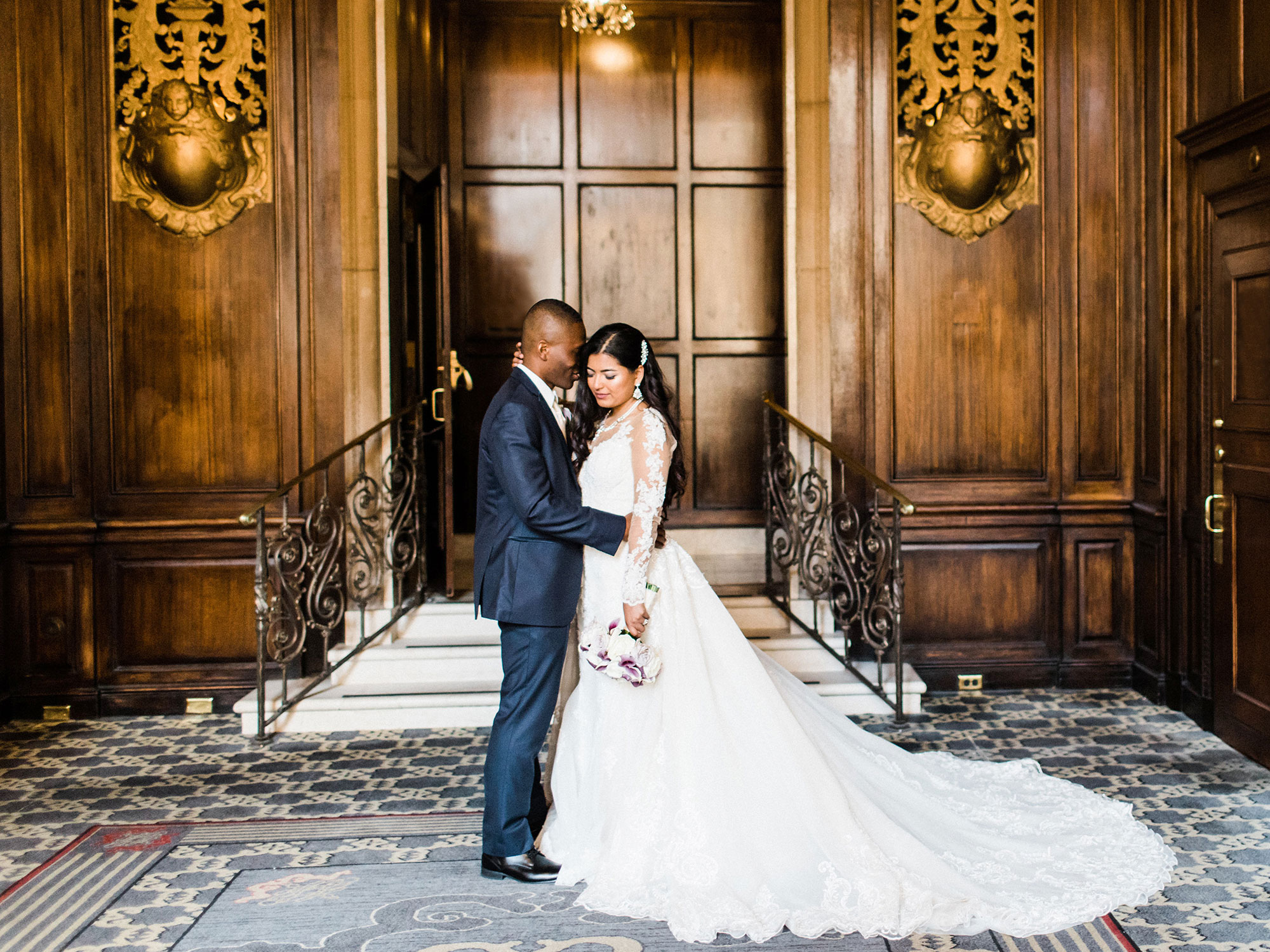 bride and groom standing in luxurious venue at their wedding Apollo Fotografie San Francisco