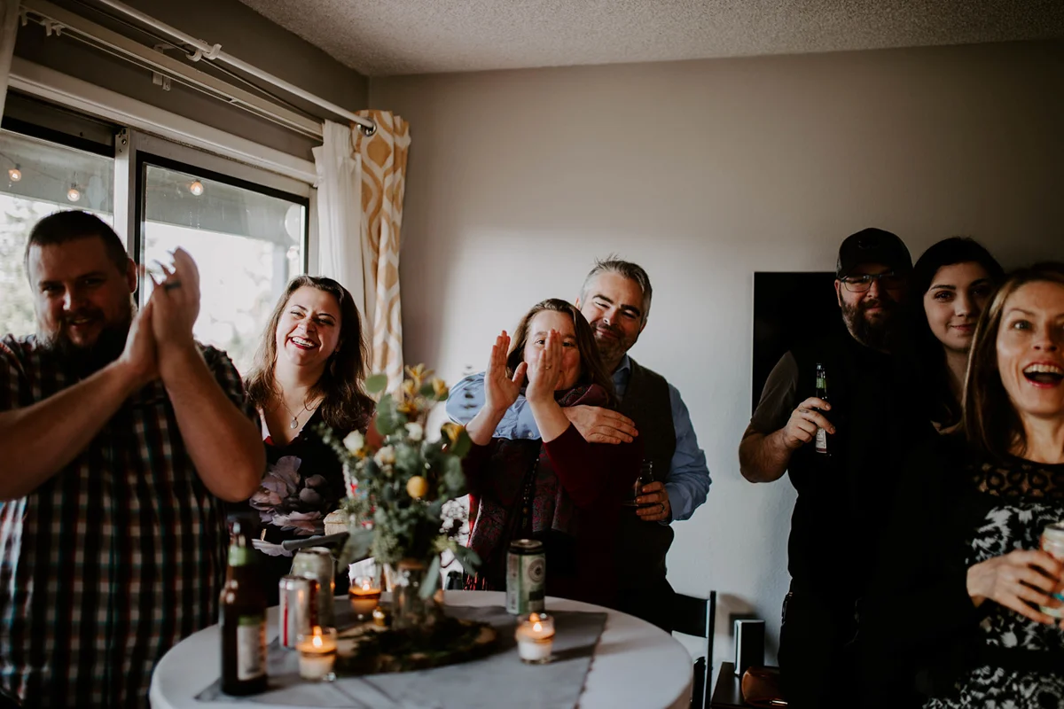 queer surprise home wedding guests clapping