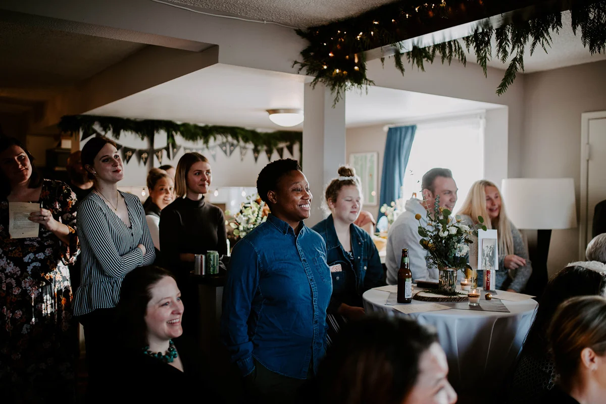 queer surprise home wedding guests during ceremony