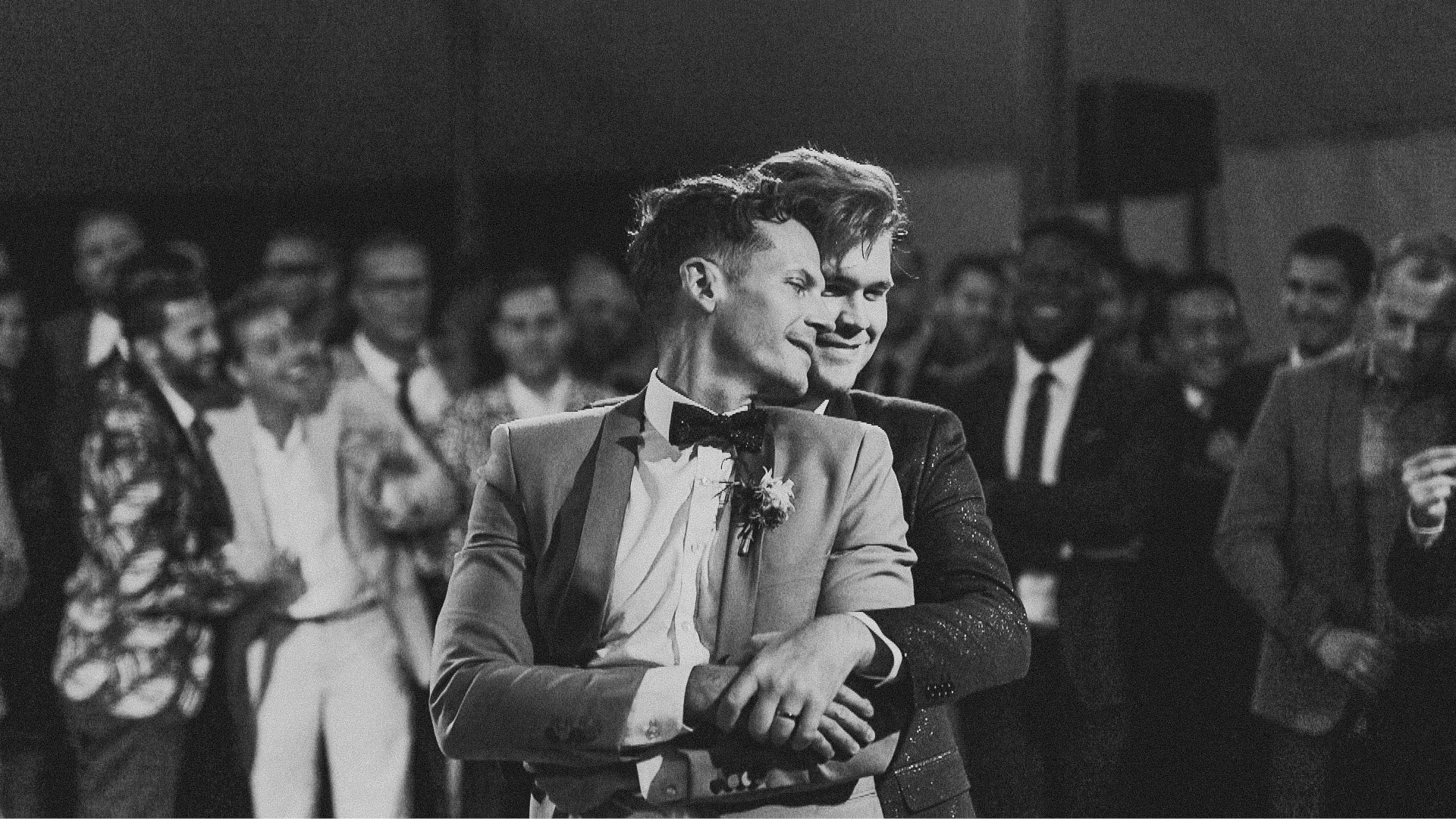 LGBTQ newlywed couple having their first dance surrounded by wedding guests Pennsylvania Love More Films