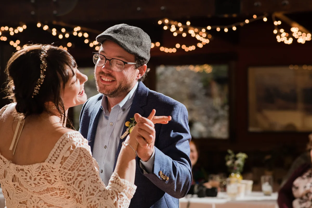 newlywed bride and groom dancing at their wedding reception Meera Graham Photography Missoula Montana