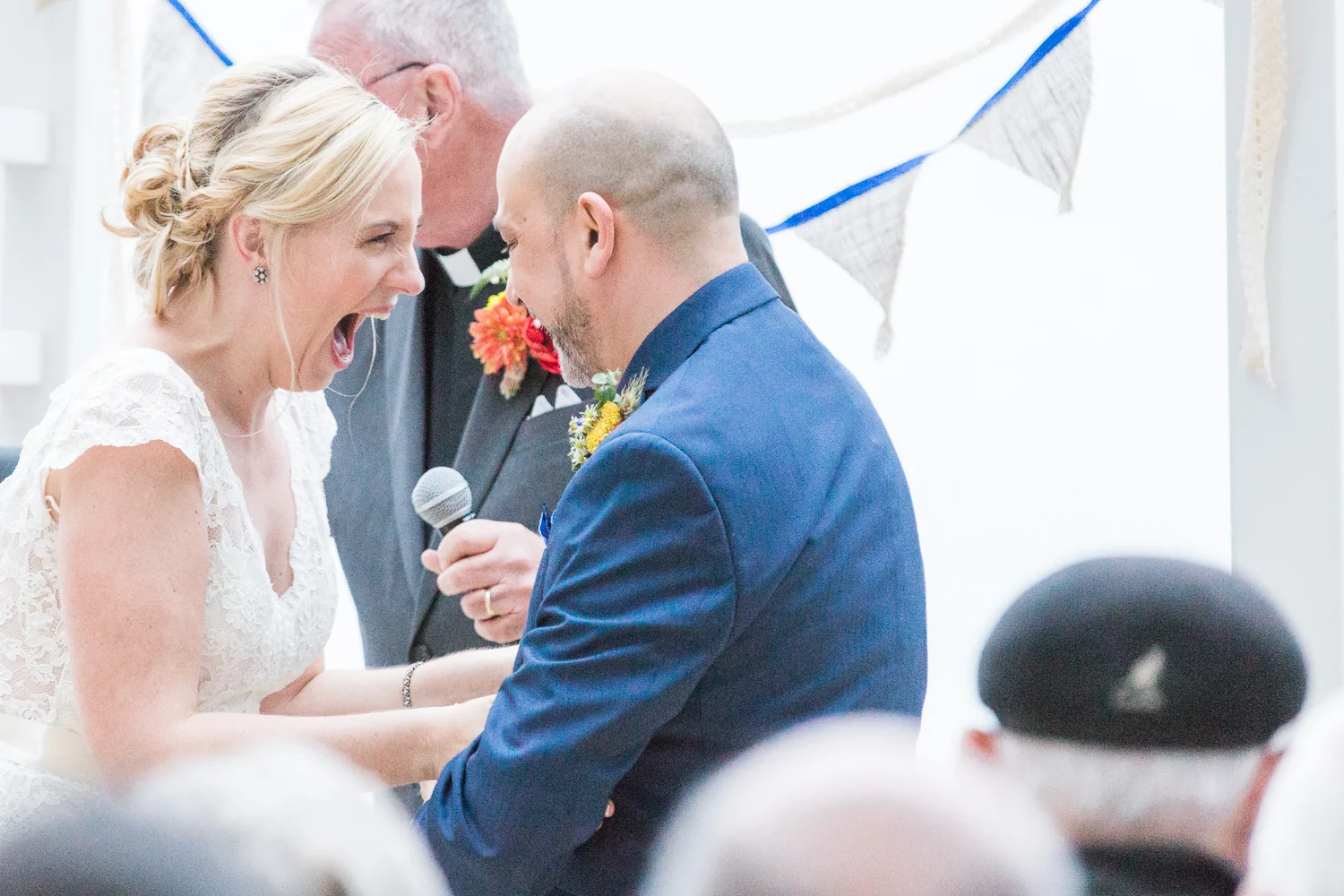 bride and groom scream with joy as they exchange vows at their wedding ceremony Meera Graham Photography wedding photographer Missoula Montana