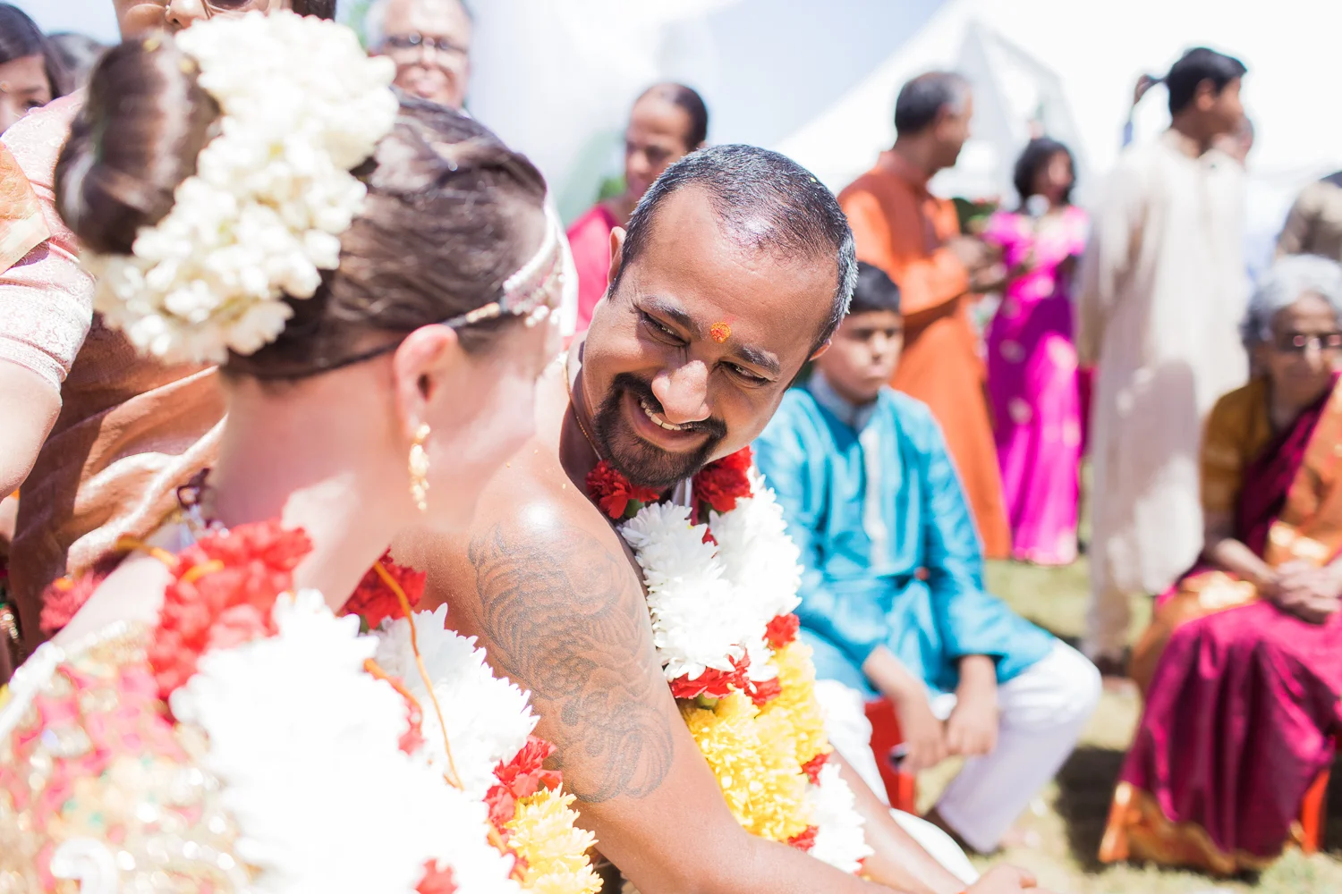 Bride and groom smiling at each other during Hindu wedding ceremony Meera Graham Photography wedding photographer Missoula Montana