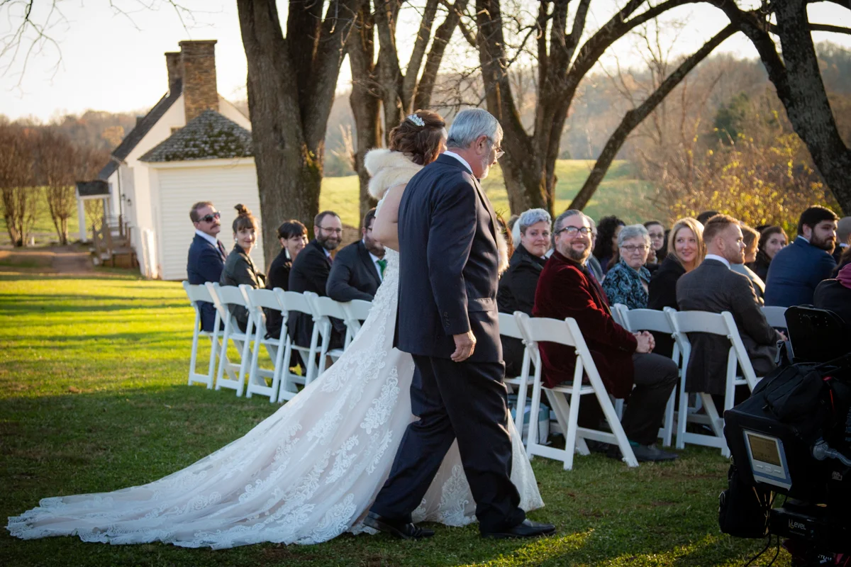 Romantic, Intimate-Feeling Wedding caroline walking down aisle in garden