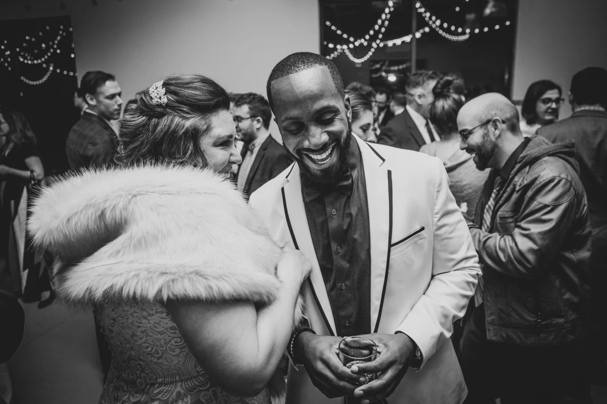 Romantic, Intimate-Feeling Wedding caroline with guest at reception