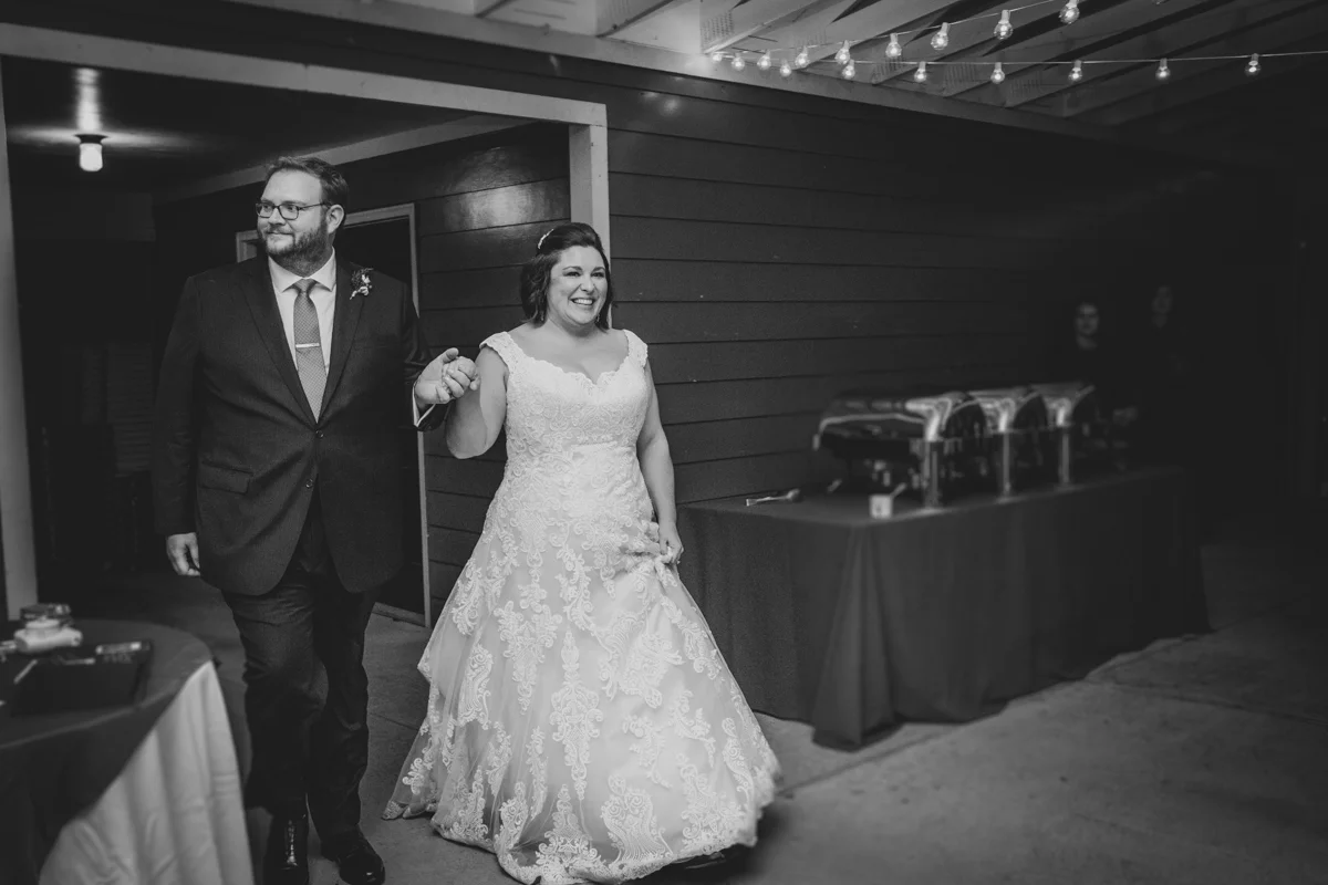 Romantic, Intimate-Feeling Wedding caroline and jon entering reception