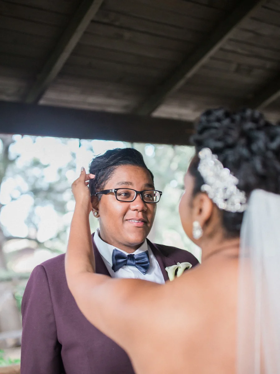los altos lutheran same-sex wedding first look tasha smoothing back alexis’s hair