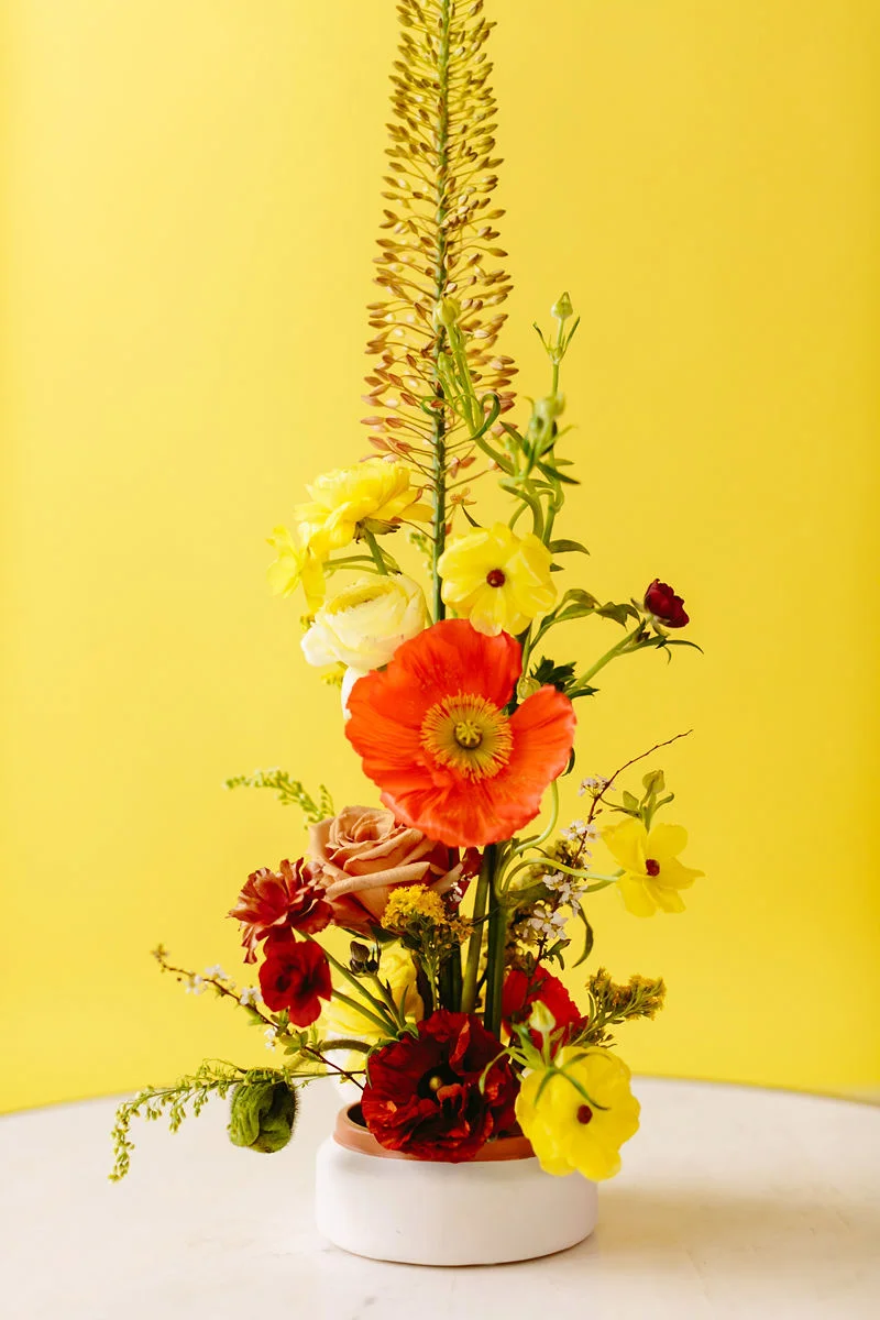 wes anderson inspired wedding brooklyn new york tall floral arrangement