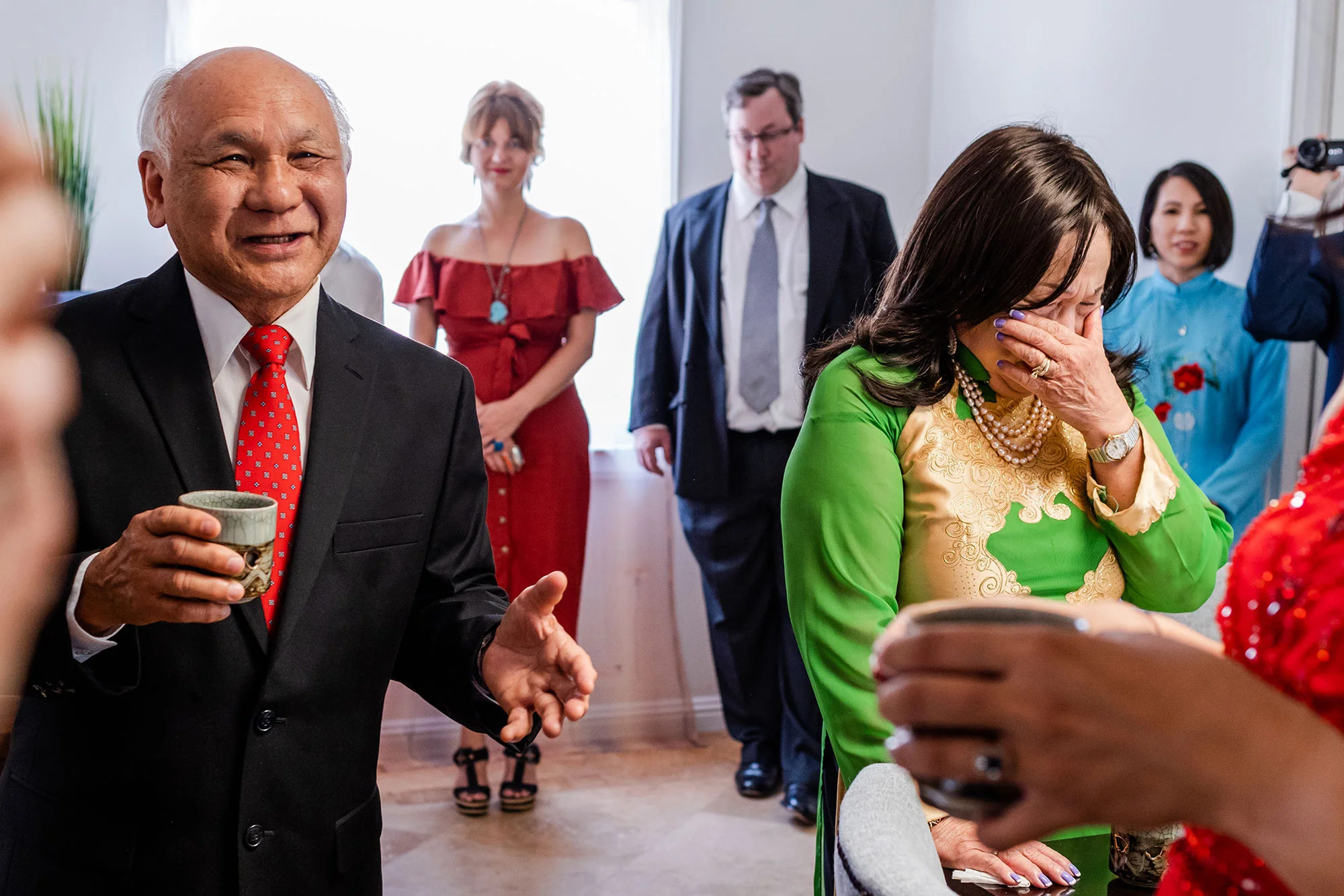 family looking on and crying during wedding reception los angeles rebecca y las otras photography