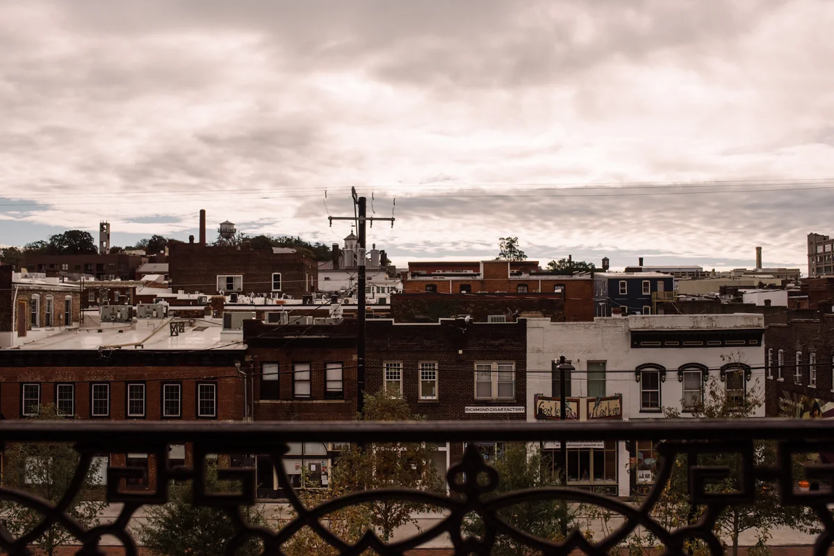 intimate wedding richmond virginia city buildings and overcast sky from balcony