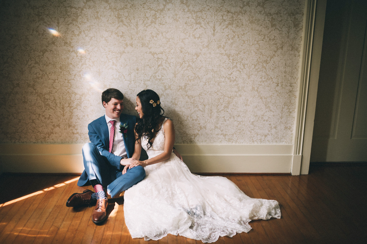Warrenwood manor danville kentucky wedding sarah katherine davis couple sitting on wood floor of manor