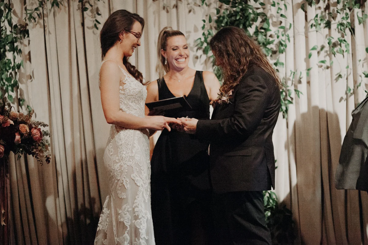 ABBY AND NICK WEDDING AMARILLO TX RITTER COLLECTIVE PHOTOGRAPHY EXCHANGING RINGS