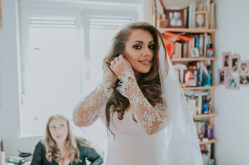 Sofia getting ready in DIY wedding dress serbia Aleska and Mina Photography