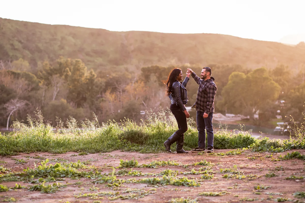 irvine regional park engagement session crystal lilly photography danielle and david holding hands on park hill
